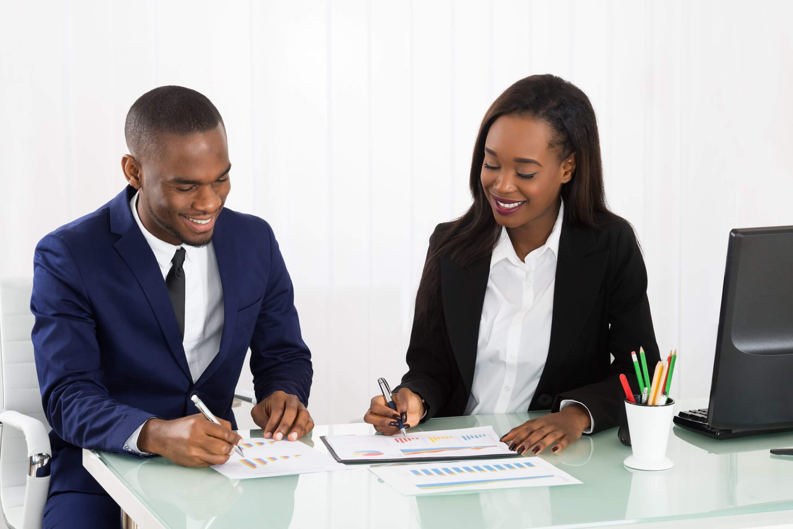 Group of colleagues greeting each other in a stylized blue duotone treatment